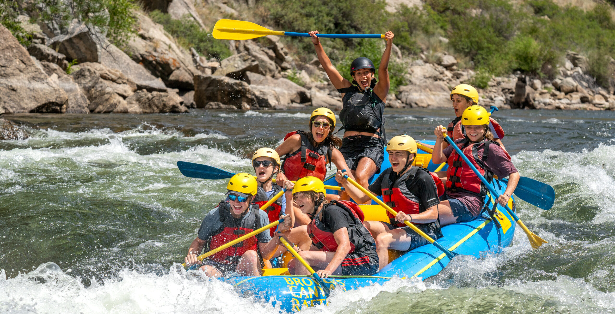 Groups raft the Arkansas river with professional guides.