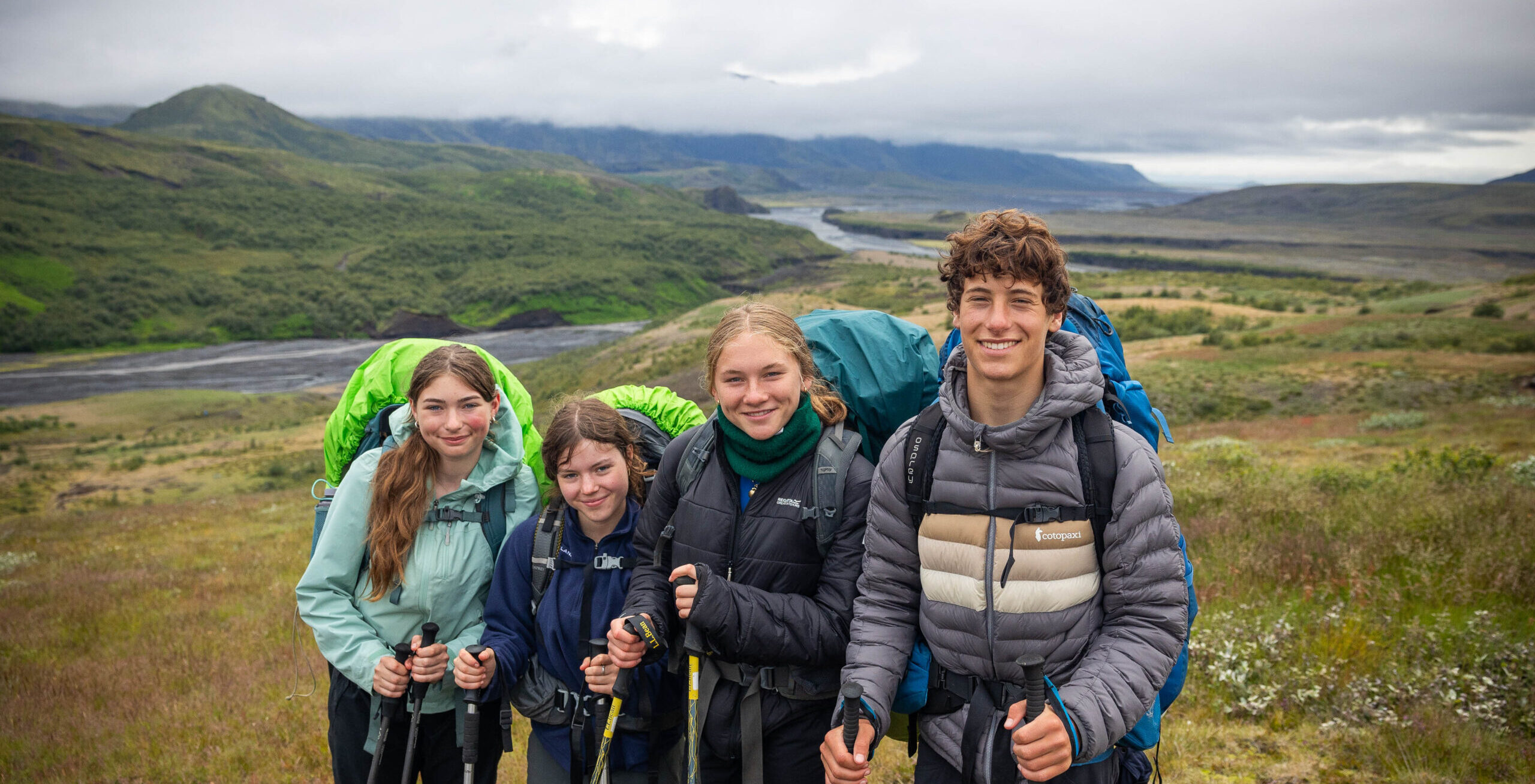 Students make friends on trail.