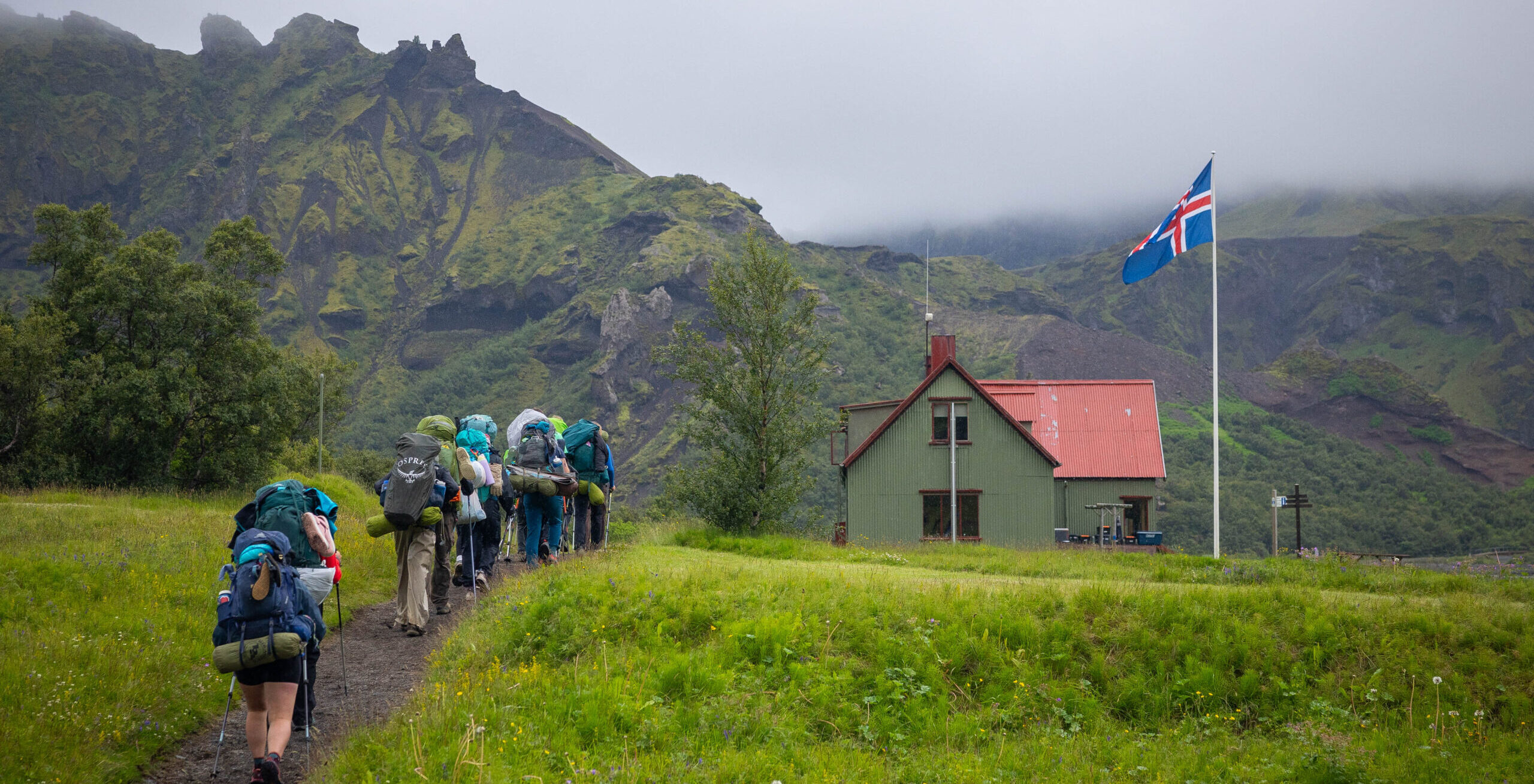 Students enjoy hikes past mountain huts.