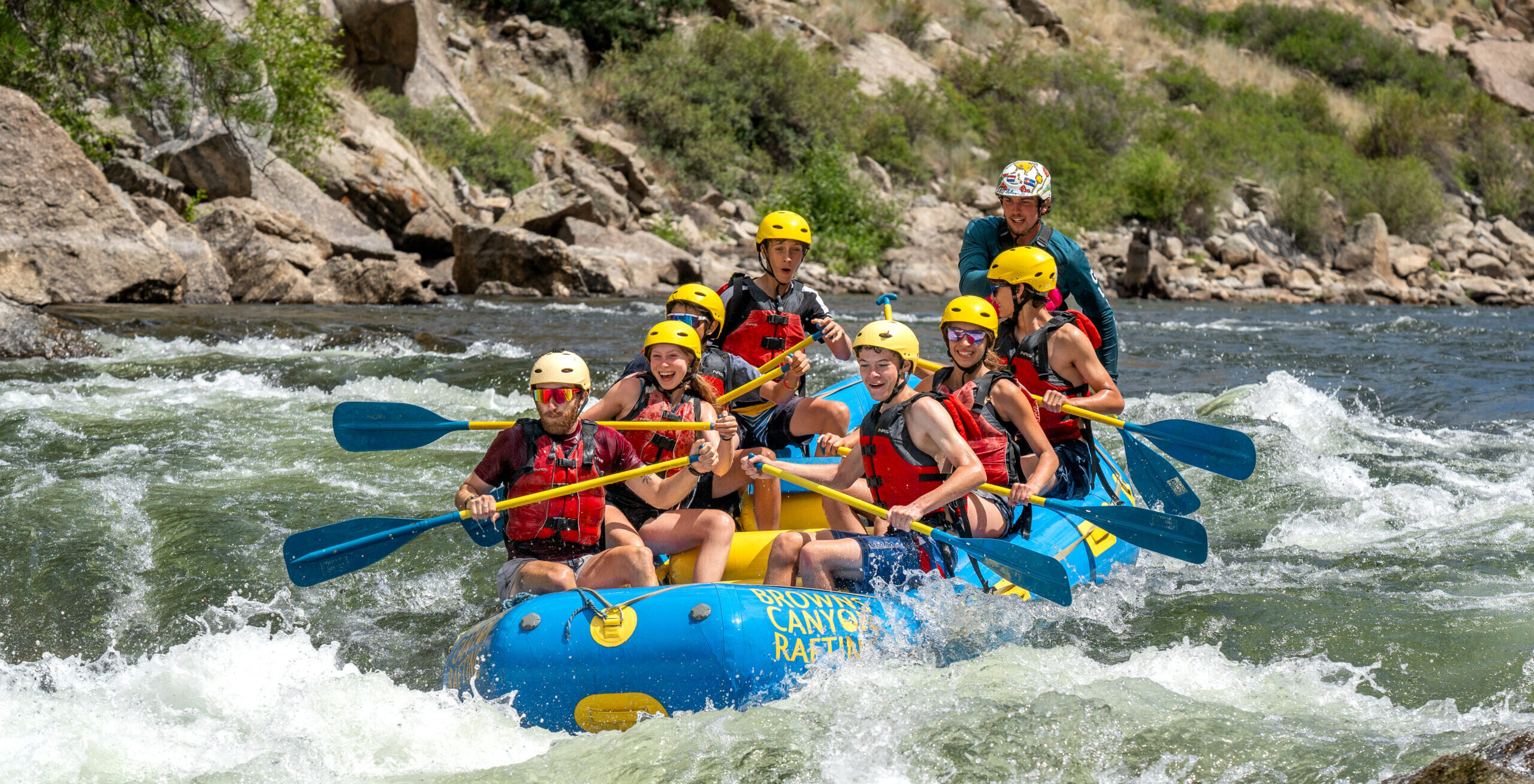 Groups raft the Arkansas river with professional guides.