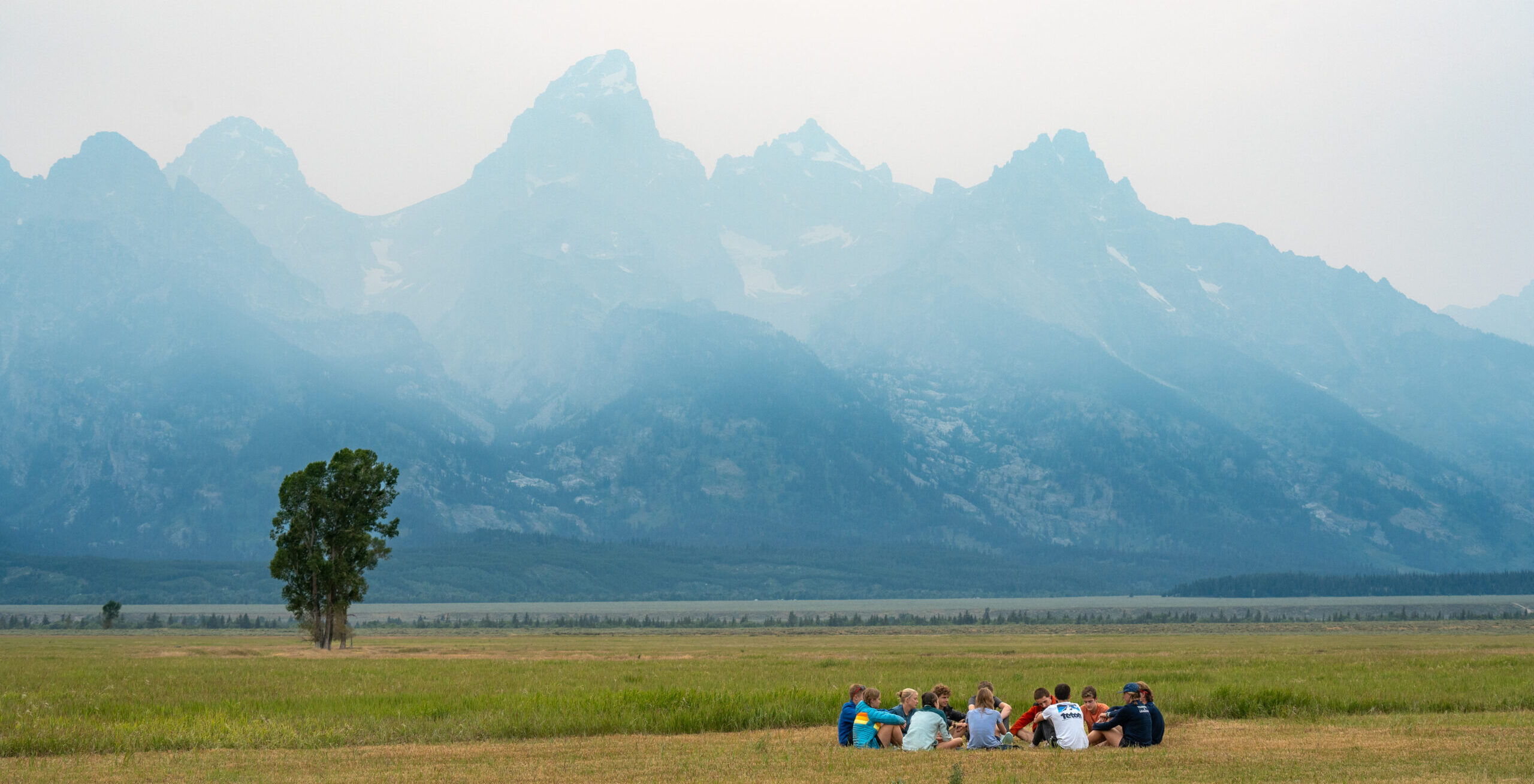 Teton challenge in front of tetons