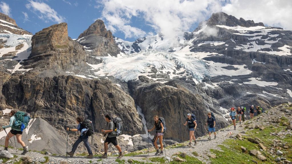 Teens hiking through the Dolomites on an Overland Summers adventure trip